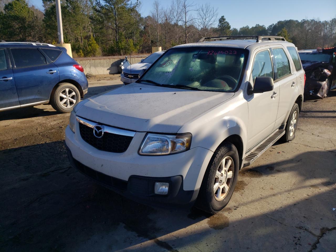Photo 9 from auction – 2011 MAZDA TRIBUTE with VIN 4F2CY0C74BKM00097
