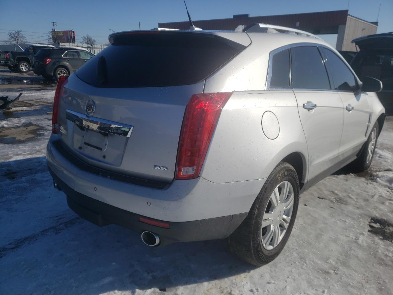 Photo 4 from auction – 2012 CADILLAC SRX LUXURY with VIN 3GYFNAE3XCS643600