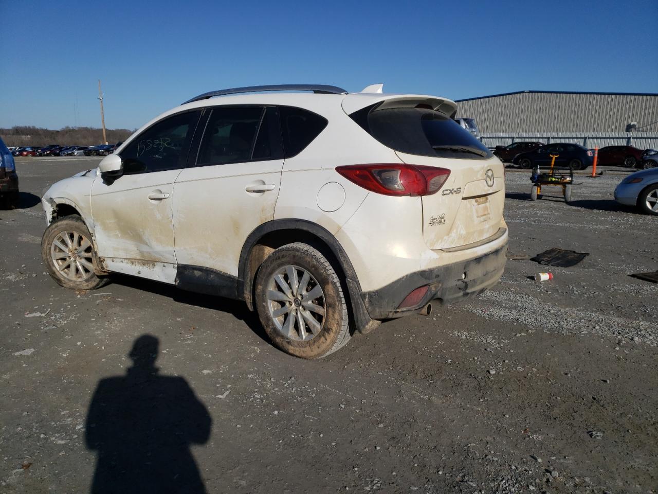 Photo 3 from auction – 2014 MAZDA CX-5 SPORT with VIN JM3KE2BE0E0373374