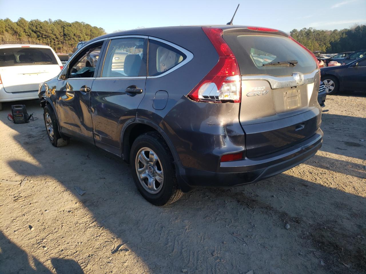 Photo 3 from auction – 2015 HONDA CR-V LX with VIN 3CZRM3H37FG714296