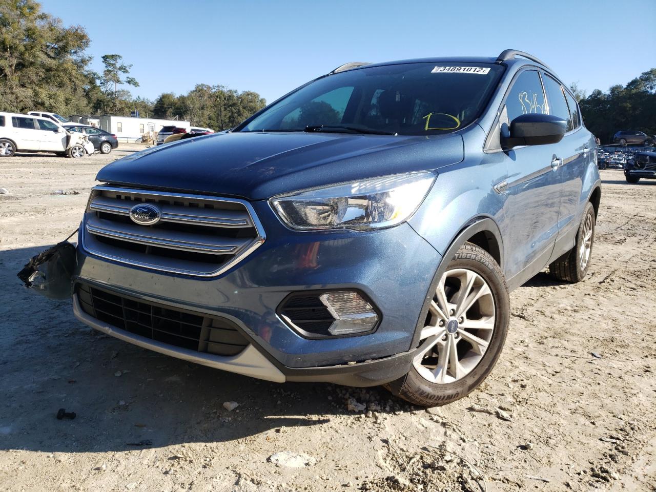 Photo 2 from auction – 2018 FORD ESCAPE SE with VIN 1FMCU0GDXJUA11782