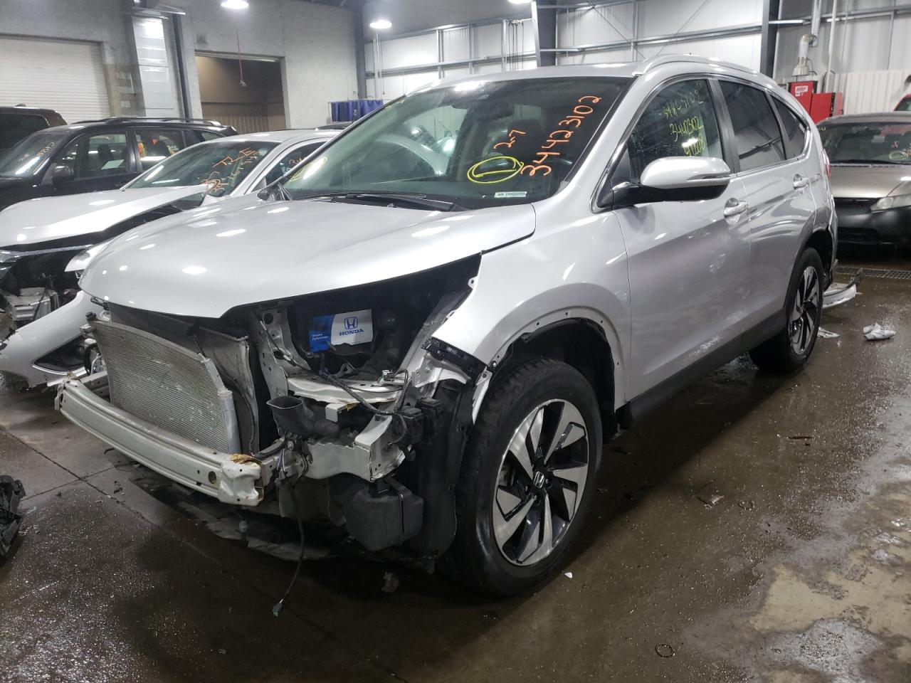 Photo 2 from auction – 2016 HONDA CR-V TOURI with VIN 5J6RM4H90GL015459