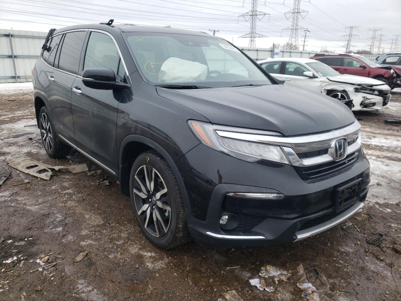 HONDA PILOT ELIT 2021 with VIN 5FNYF6H09MB095545 - Photo from auction
