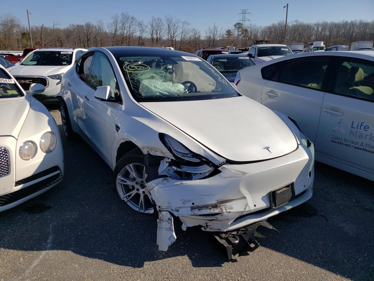 TESLA MODEL Y 2021 with VIN 5YJYGDEE5MF066402 - Photo from auction