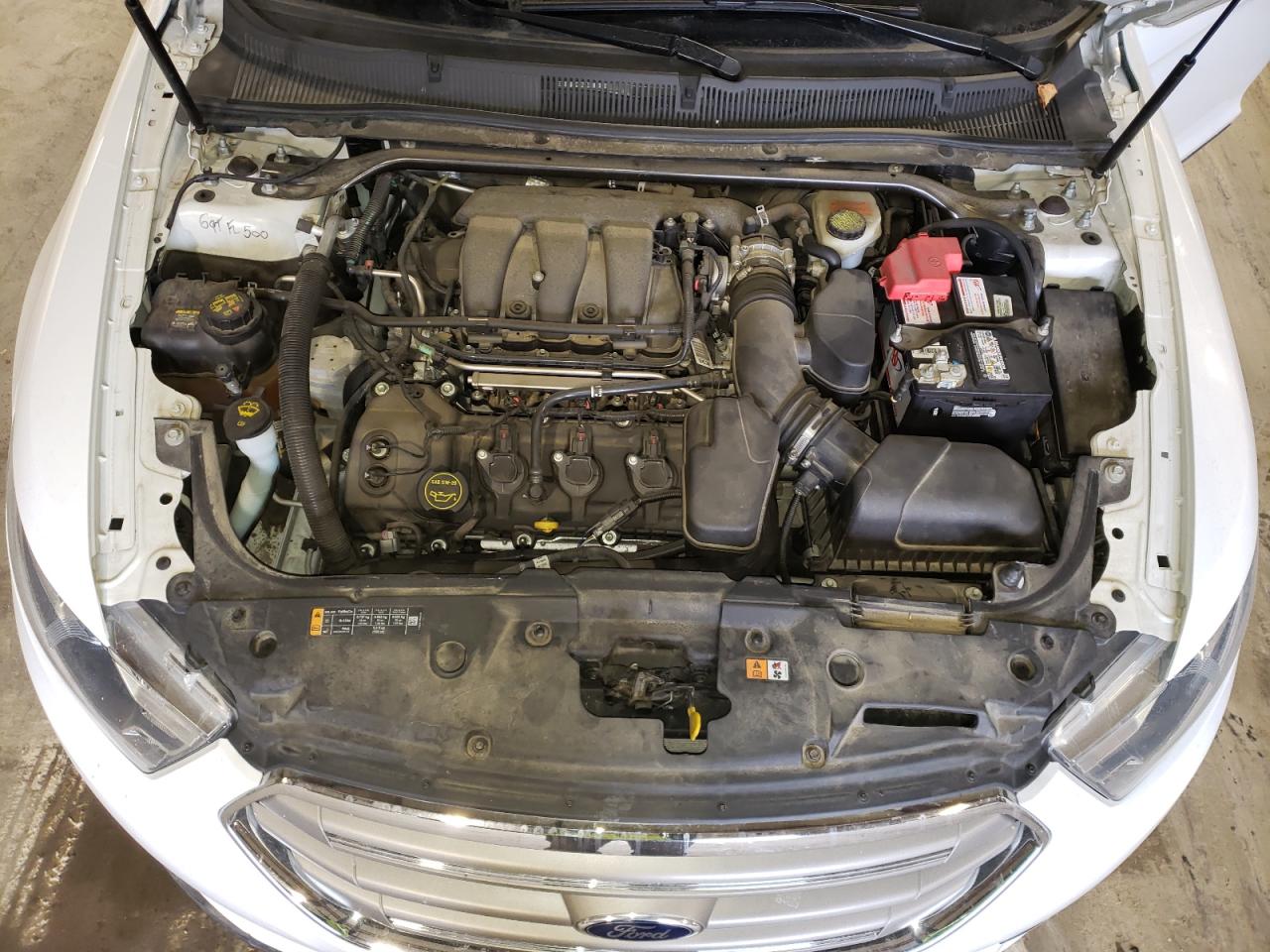 Photo 7 from auction – 2014 FORD TAURUS SEL with VIN 1FAHP2E83EG155932