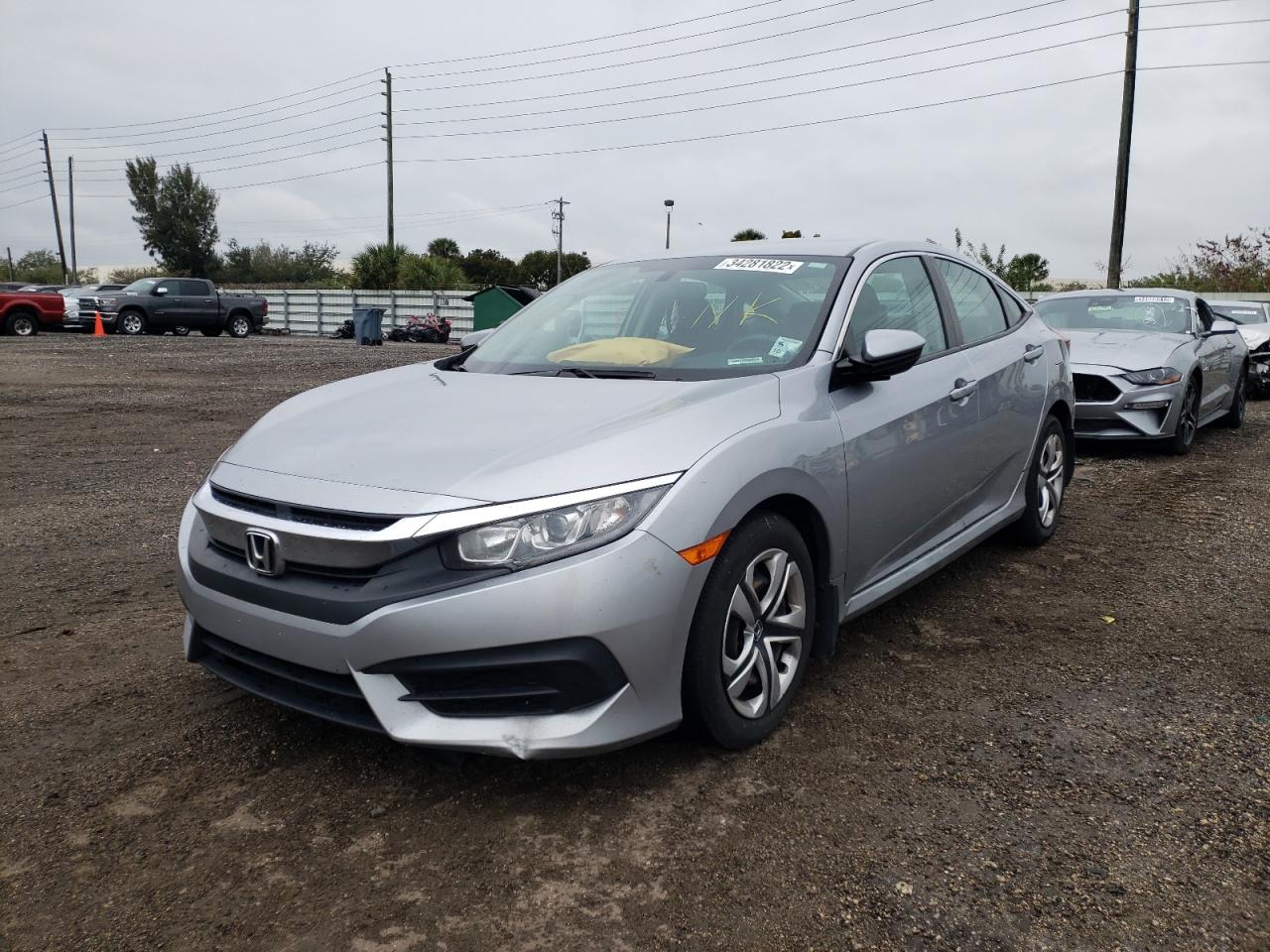 Photo 2 from auction – 2017 HONDA CIVIC LX with VIN 19XFC2F50HE019473