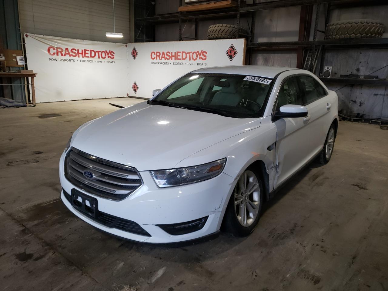 Photo 2 from auction – 2014 FORD TAURUS SEL with VIN 1FAHP2E83EG155932