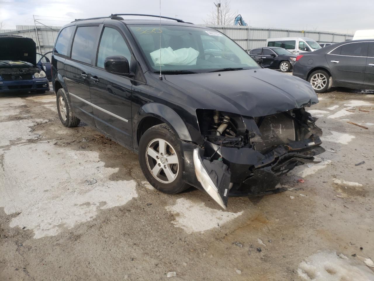 DODGE GRAND CARA 2010 with VIN 2D4RN5D13AR231879 - Photo from auction