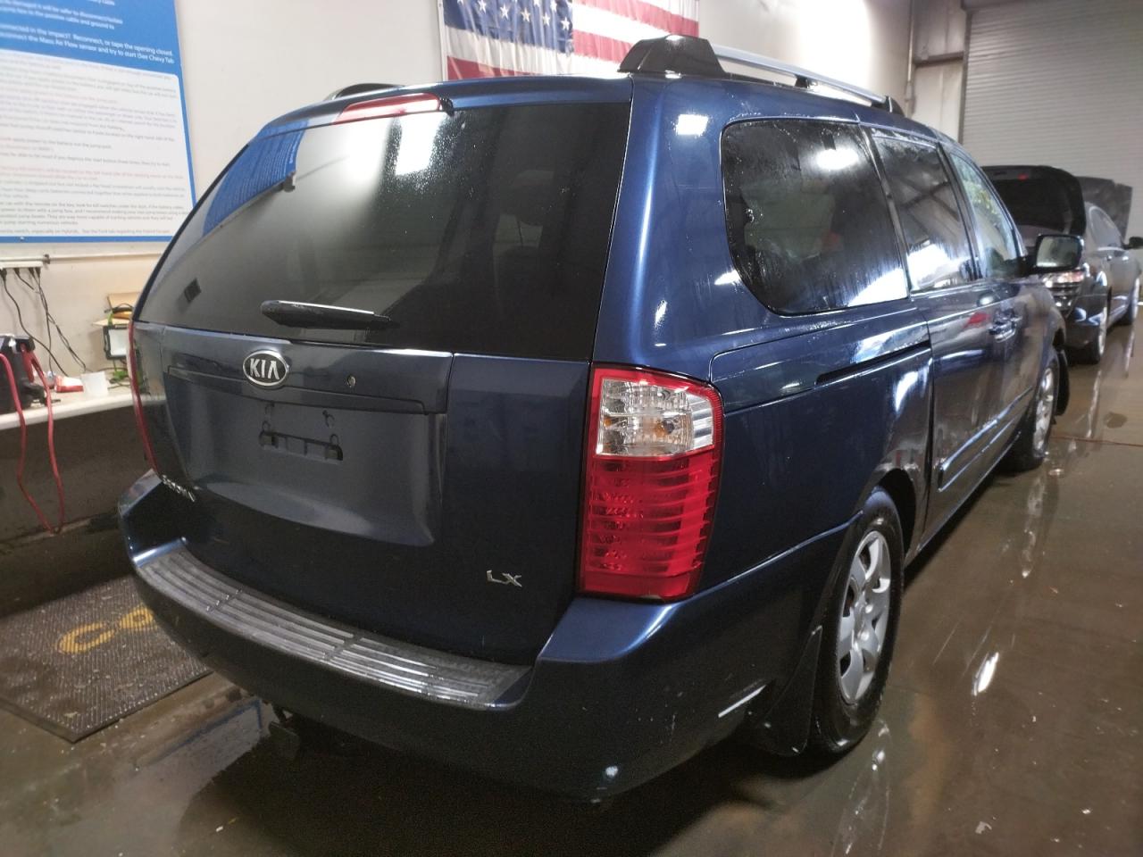 Photo 4 from auction – 2006 KIA SEDONA EX with VIN KNDMB233766060604