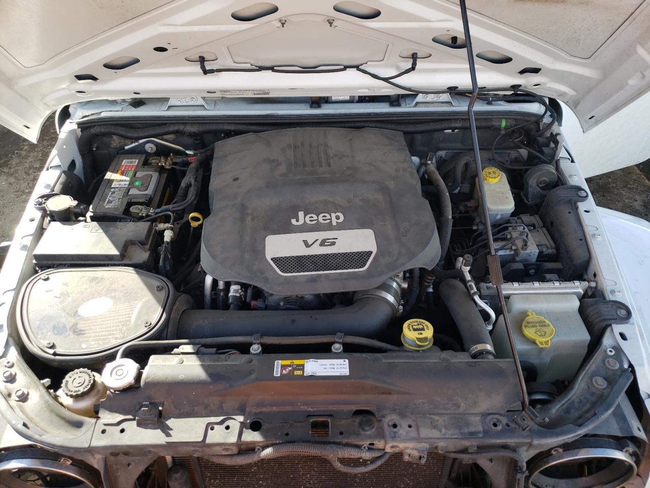 Photo 7 from auction – 2014 JEEP WRANGLER U with VIN 1C4BJWDG1EL183558