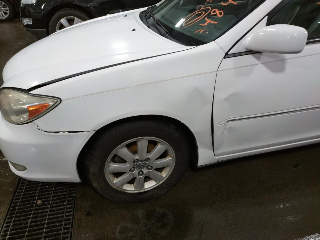 Photo 9 from auction – 2004 TOYOTA CAMRY LE with VIN 4T1BE30K44U271554