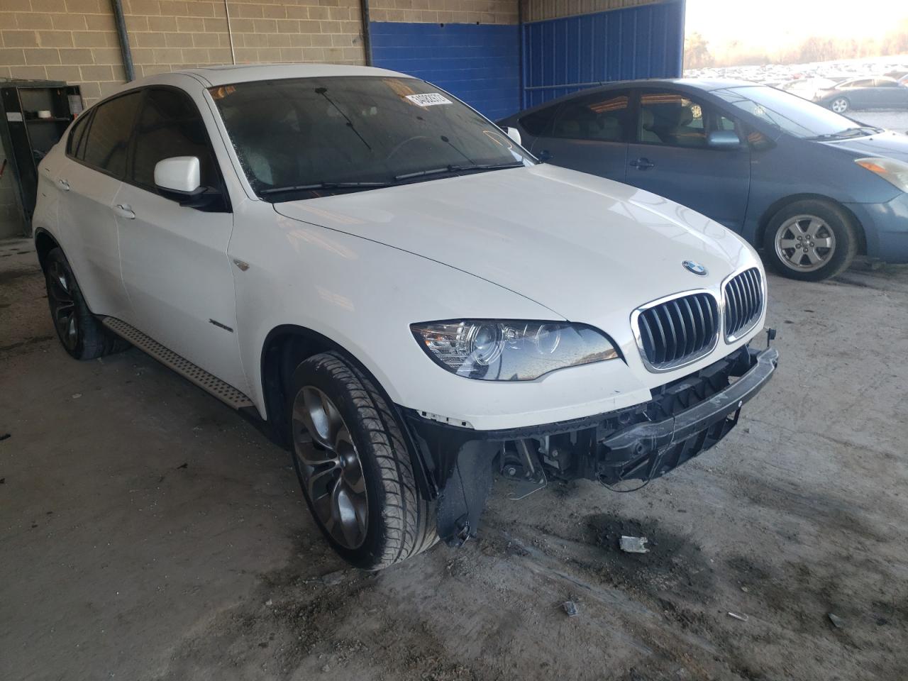 BMW X6 XDRIVE3 2014 with VIN 5UXFG2C57E0H09803 - Photo from auction