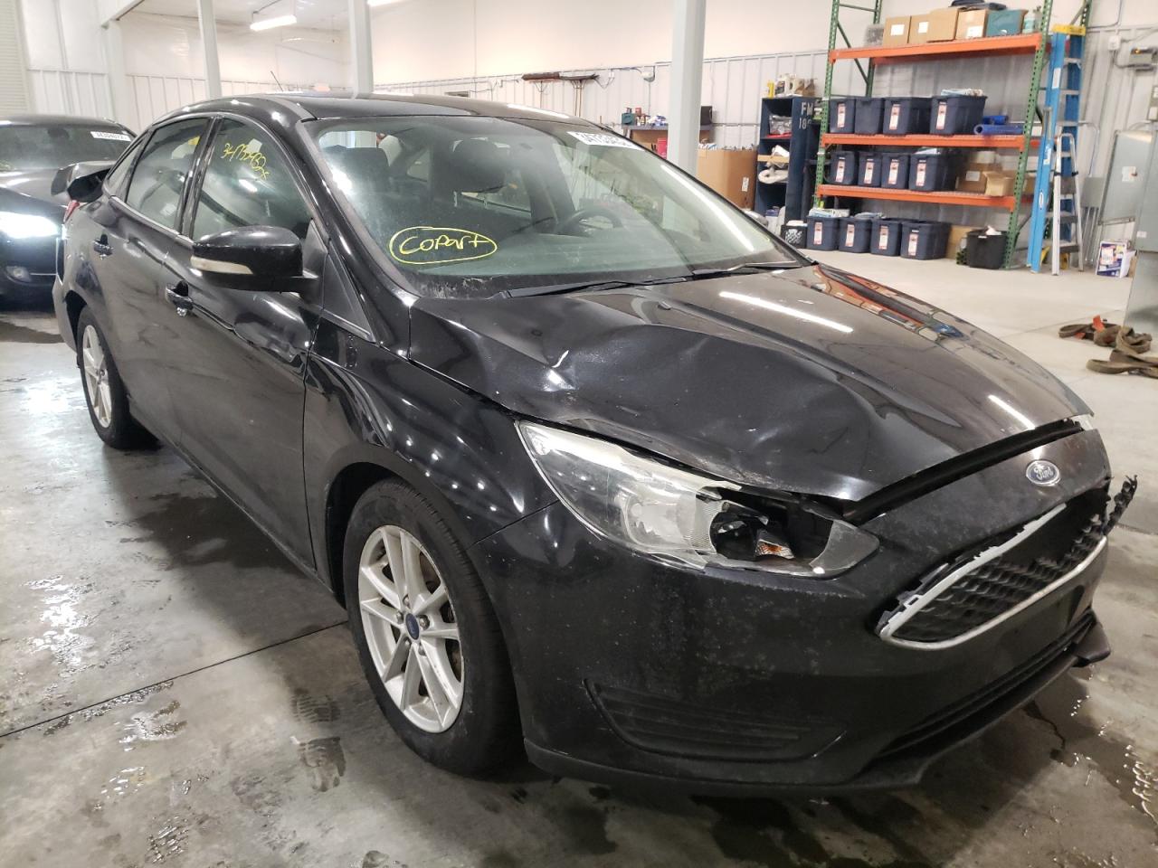 FORD FOCUS SE 2015 with VIN 1FADP3F24FL270918 - Photo from auction