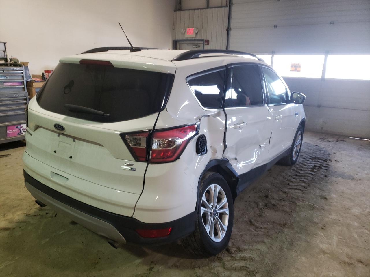 Photo 4 from auction – 2018 FORD ESCAPE SE with VIN 1FMCU9GD2JUB66654