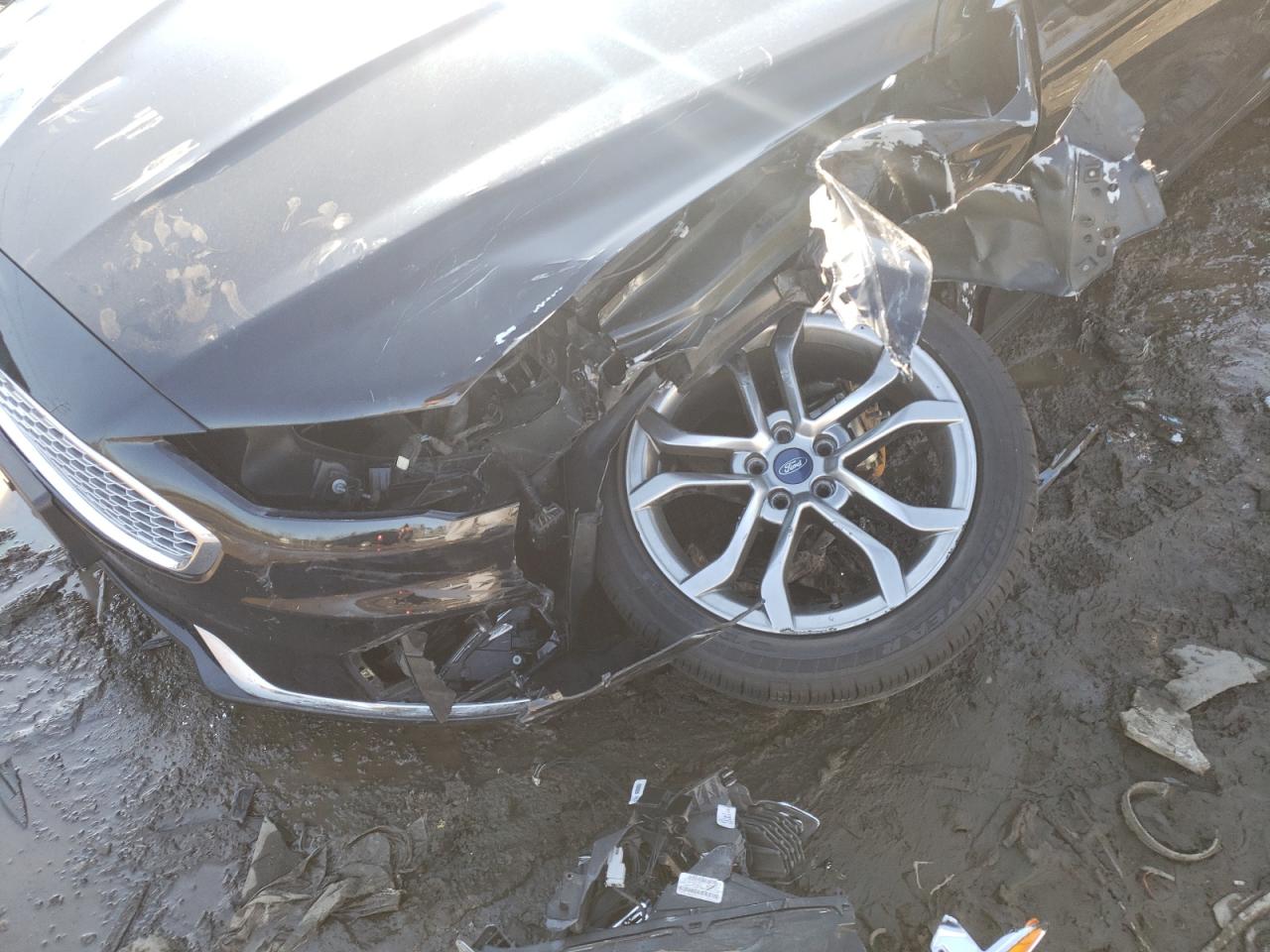Photo 9 from auction – 2019 FORD FUSION TIT with VIN 3FA6P0RU0KR128534