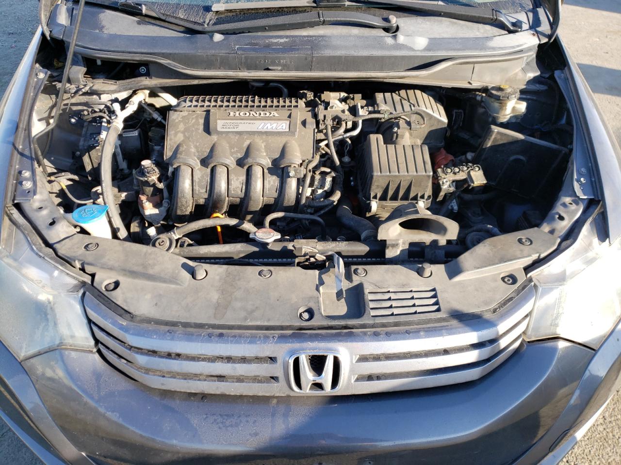 Photo 7 from auction – 2010 HONDA INSIGHT EX with VIN JHMZE2H70AS024681