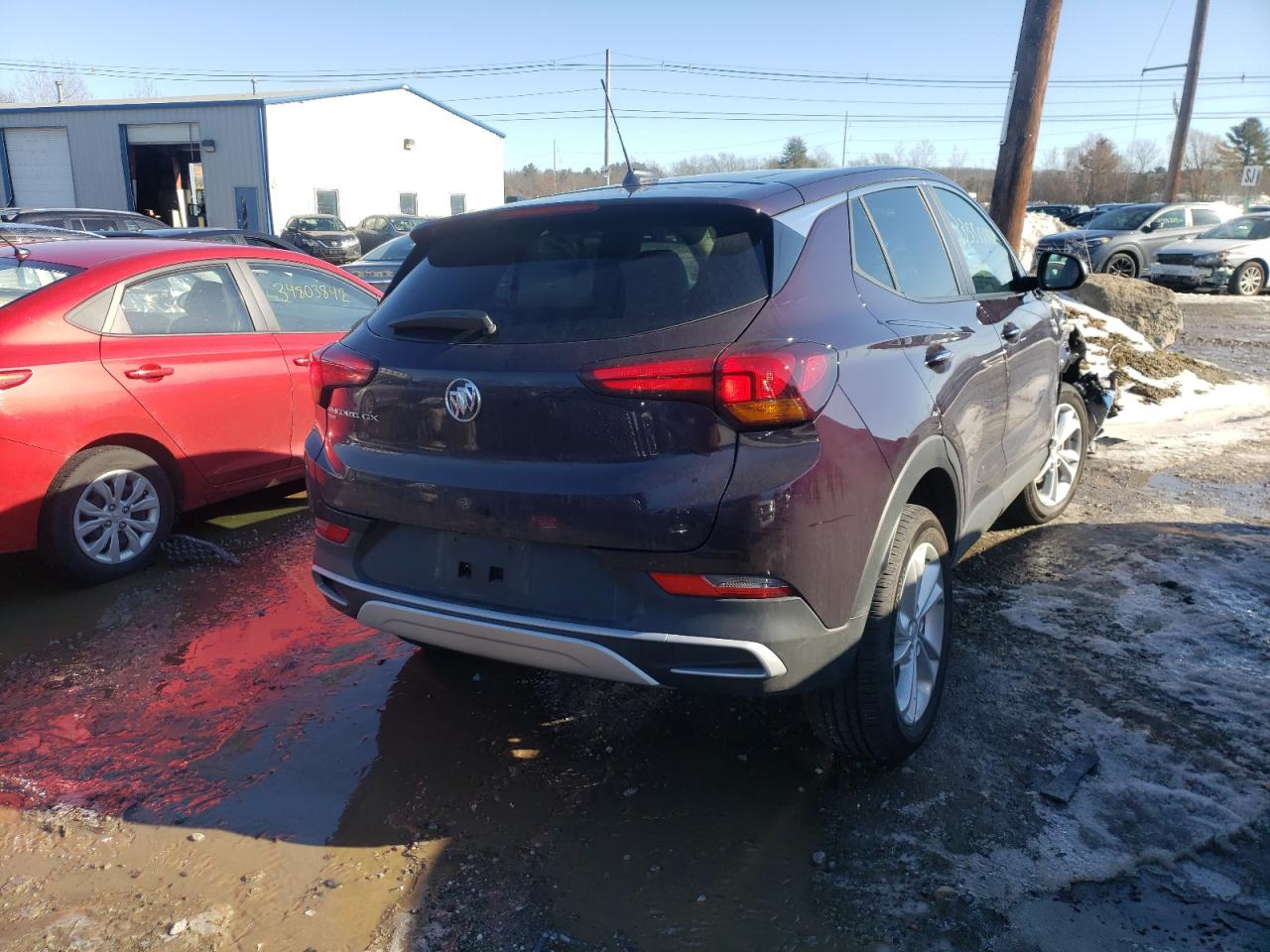 Photo 4 from auction – 2021 BUICK ENCORE GX with VIN KL4MMCSL9MB093149
