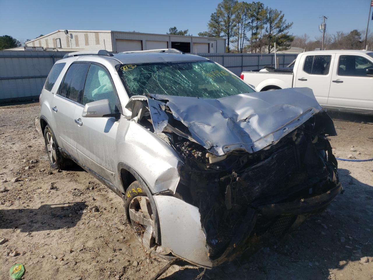 GMC ACADIA SLT 2010 with VIN 1GKLRMED6AJ160597 - Photo from auction