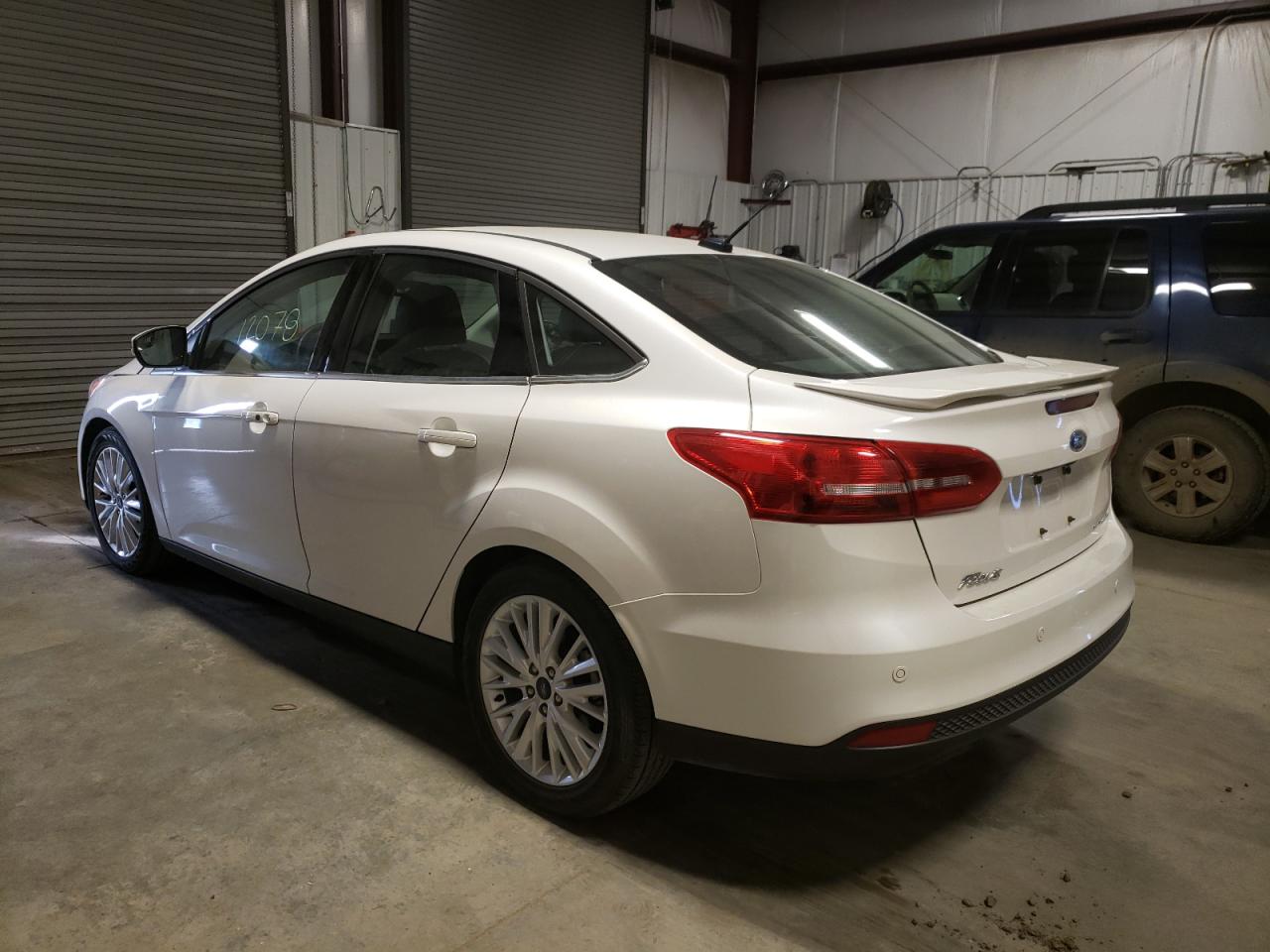 Photo 3 from auction – 2018 FORD FOCUS TITA with VIN 1FADP3J27JL246760
