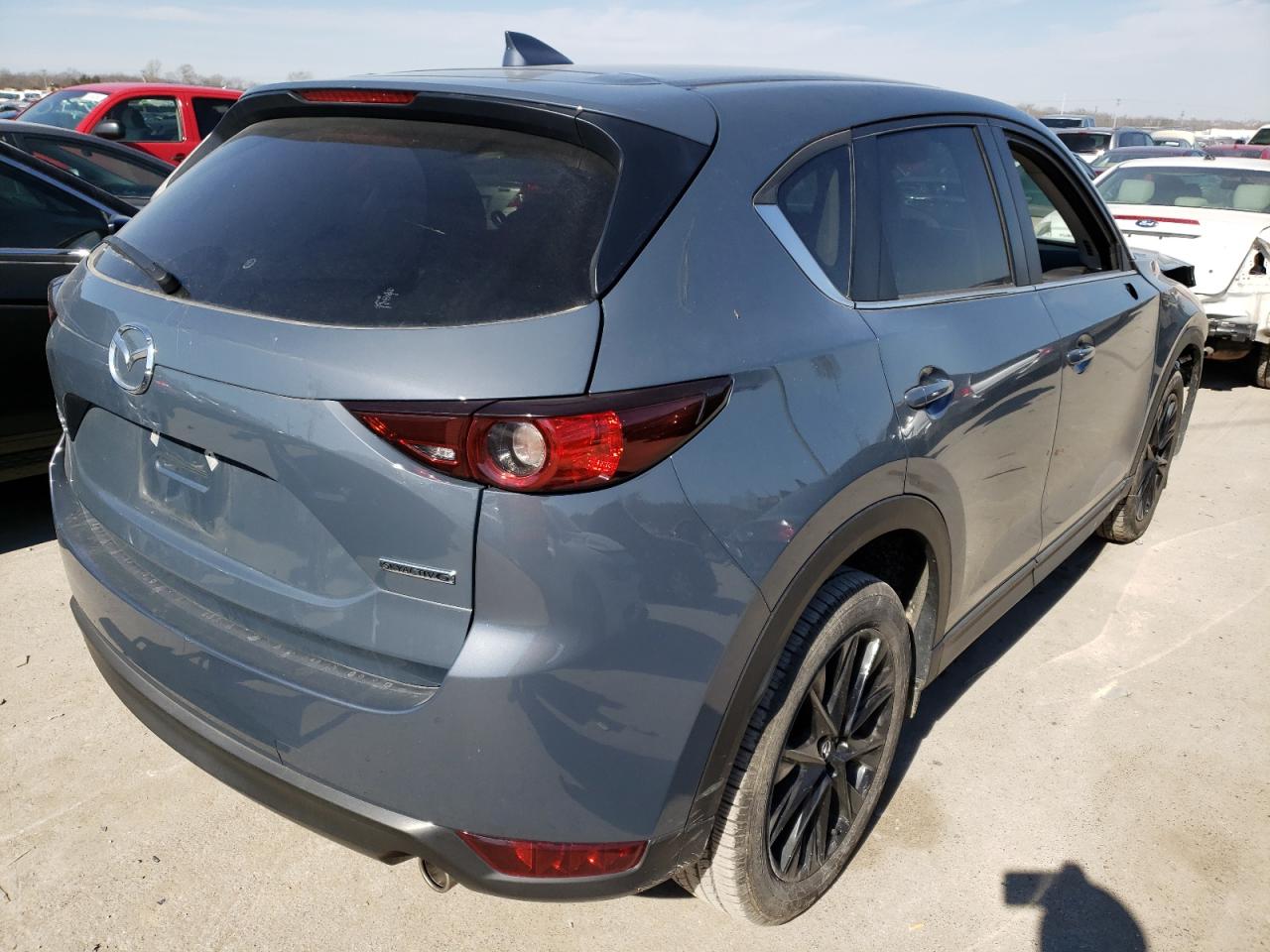 Photo 4 from auction – 2021 MAZDA CX-5 TOURI with VIN JM3KFBCM2M0335565