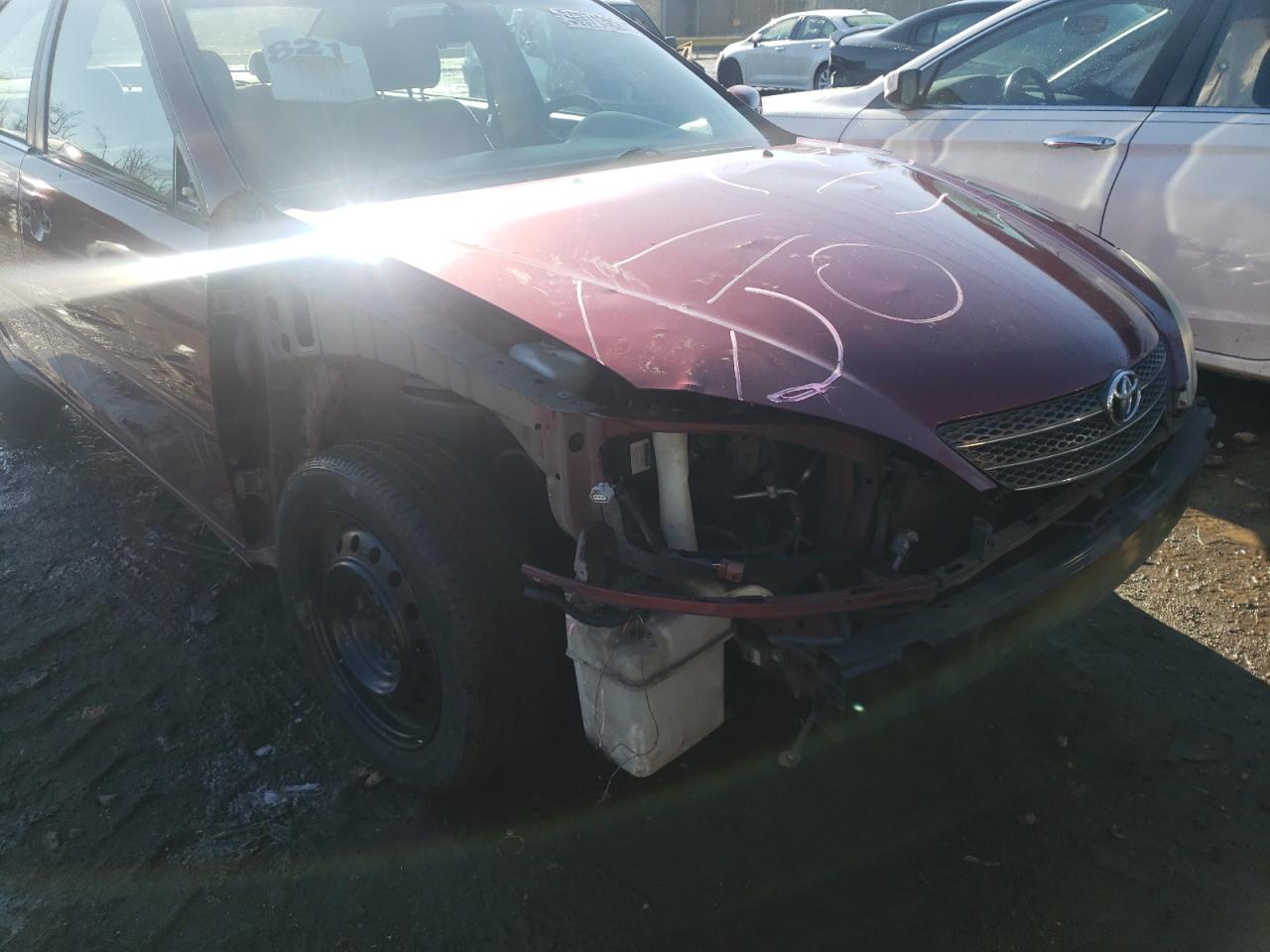 Photo 9 from auction – 2004 TOYOTA CAMRY LE with VIN 4T1BE30KX4U321633