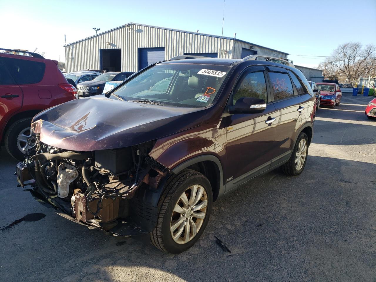 Photo 2 from auction – 2011 KIA SORENTO EX with VIN 5XYKUDA24BG010399