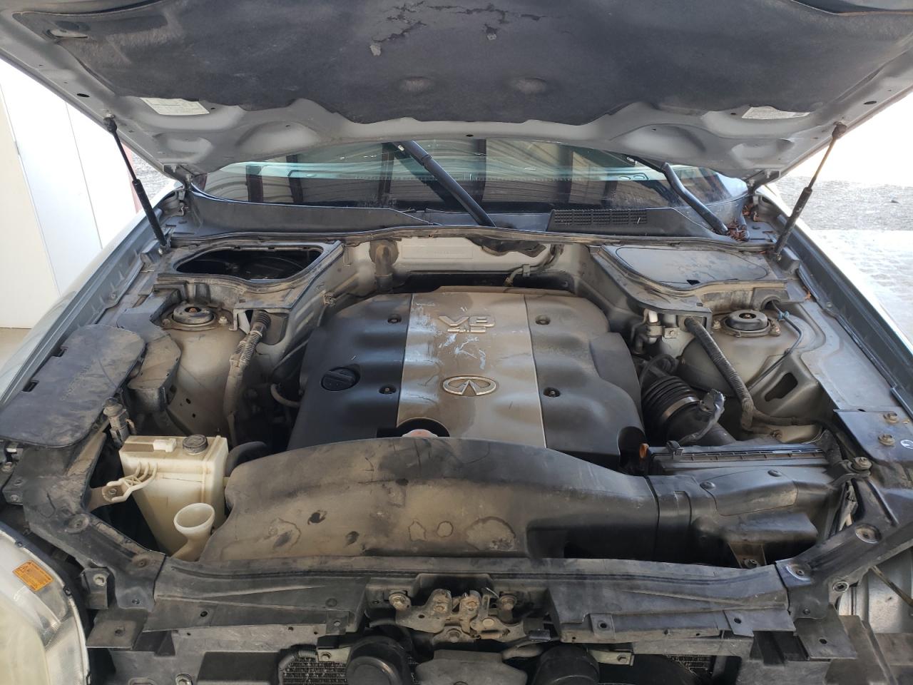 Photo 7 from auction – 2004 INFINITI FX45 with VIN JNRBS08W64X405014