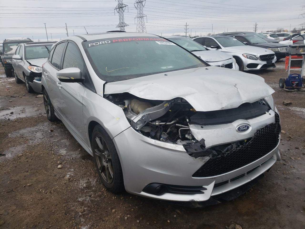 FORD FOCUS ST 2014 with VIN 1FADP3L96EL105324 - Photo from auction
