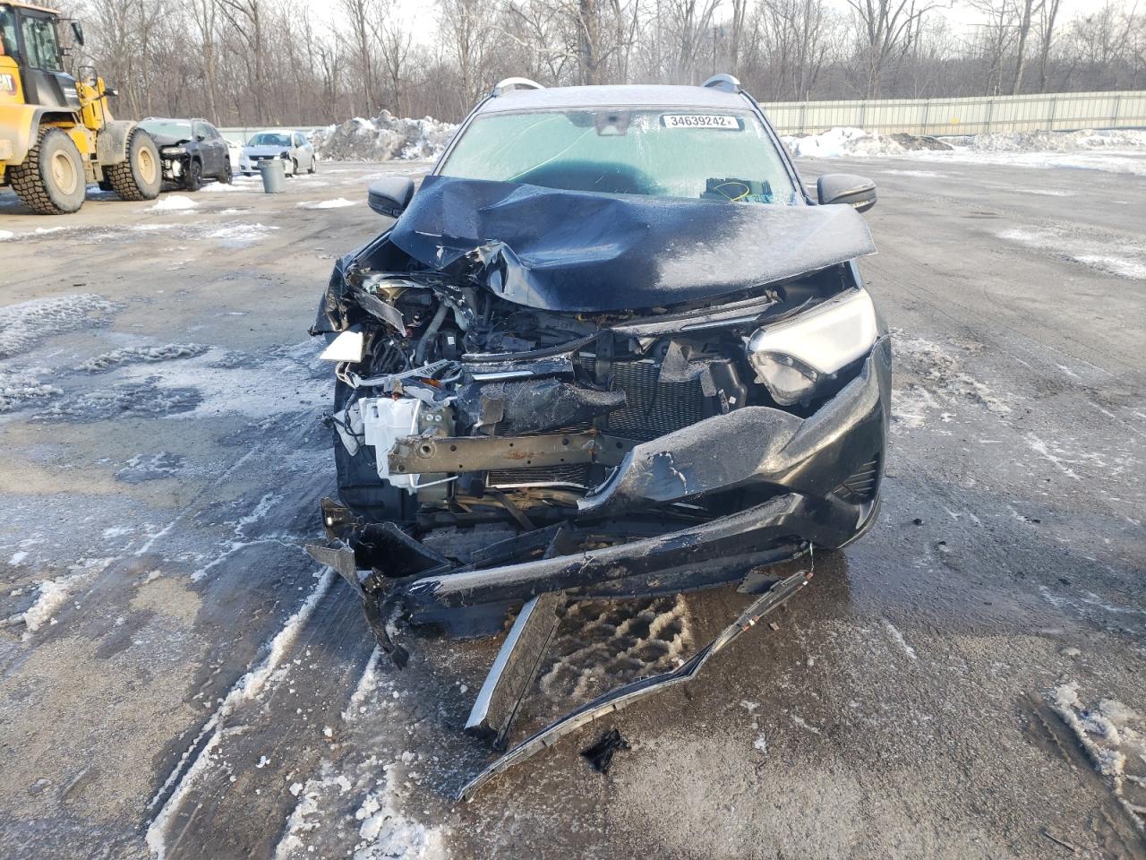 Photo 9 from auction – 2017 TOYOTA RAV4 LE with VIN 2T3BFREV6HW604367