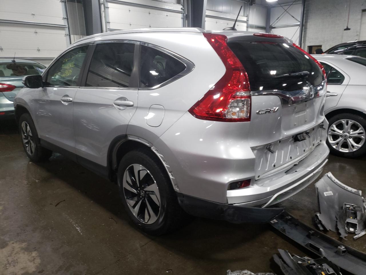 Photo 3 from auction – 2016 HONDA CR-V TOURI with VIN 5J6RM4H90GL015459