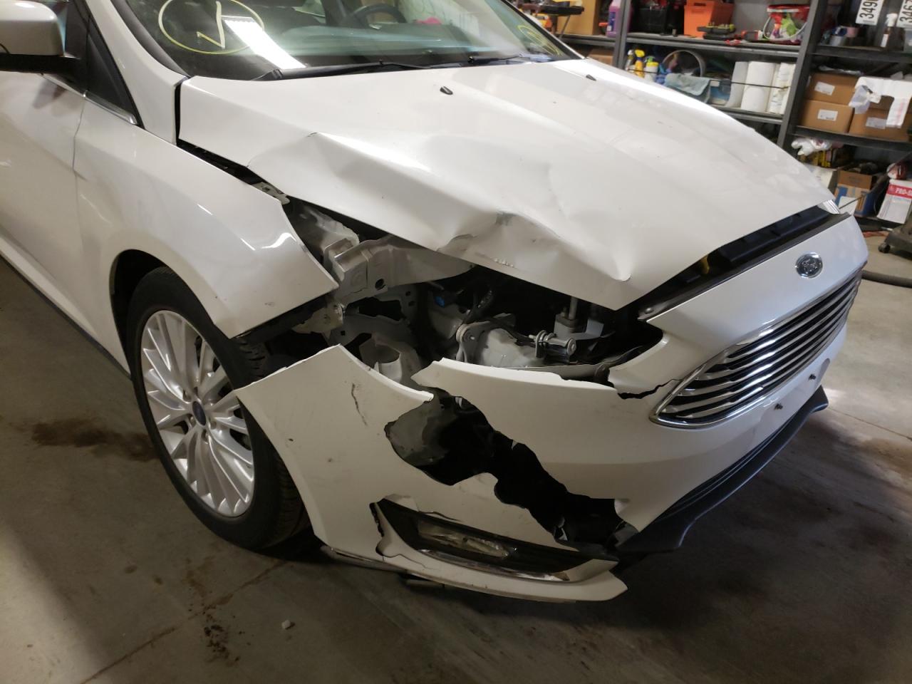 Photo 9 from auction – 2018 FORD FOCUS TITA with VIN 1FADP3J27JL246760