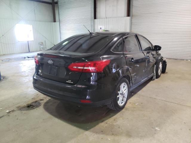 Photo 4 from auction – 2015 FORD FOCUS SE with VIN 1FADP3F24FL311533