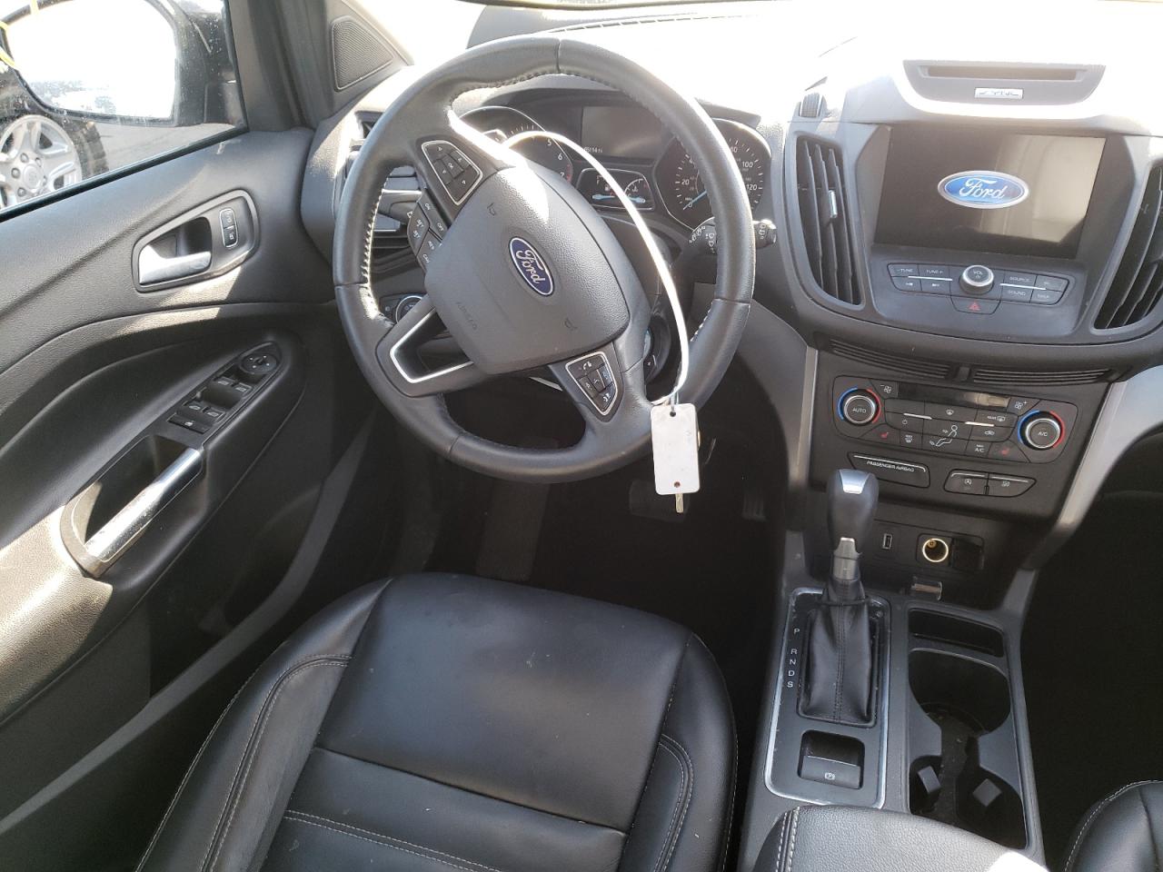 Photo 9 from auction – 2017 FORD ESCAPE SE with VIN 1FMCU9GD3HUD09363