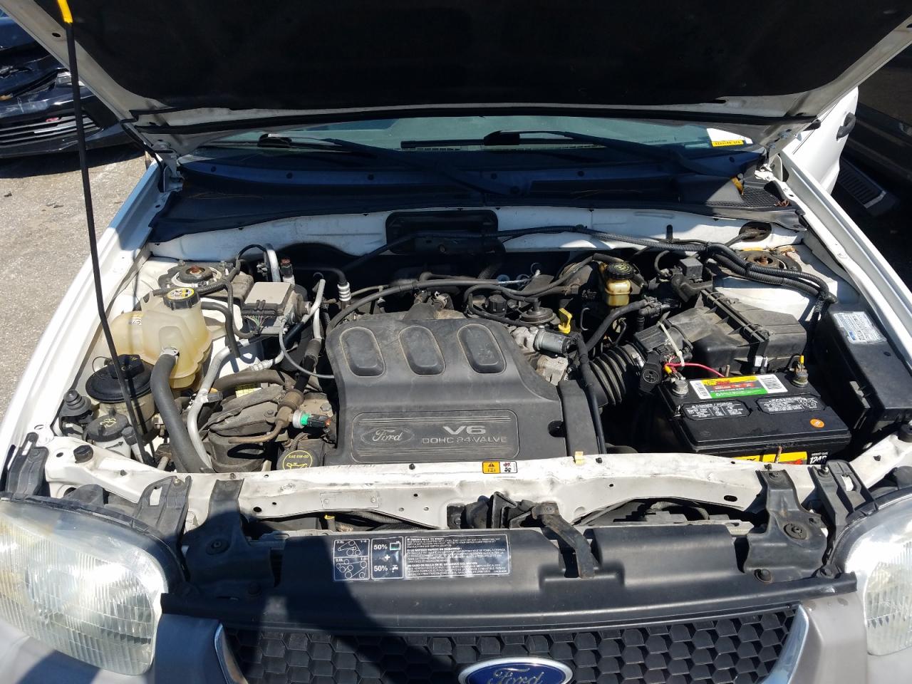 Photo 7 from auction – 2002 FORD ESCAPE XLT with VIN 1FMCU03112KD49046