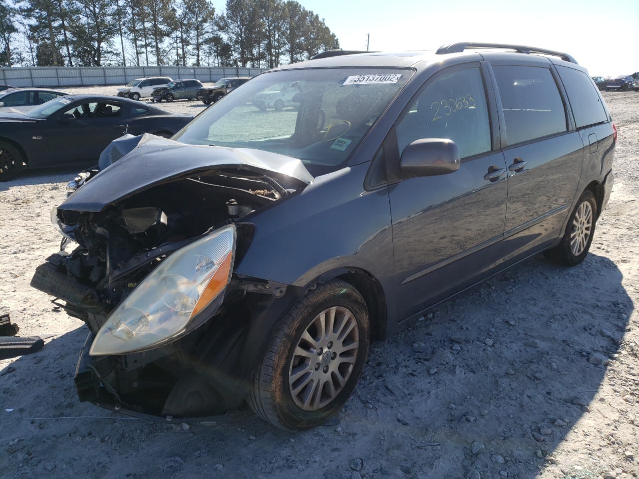 Photo 2 from auction – 2009 TOYOTA SIENNA XLE with VIN 5TDZK22C19S278498