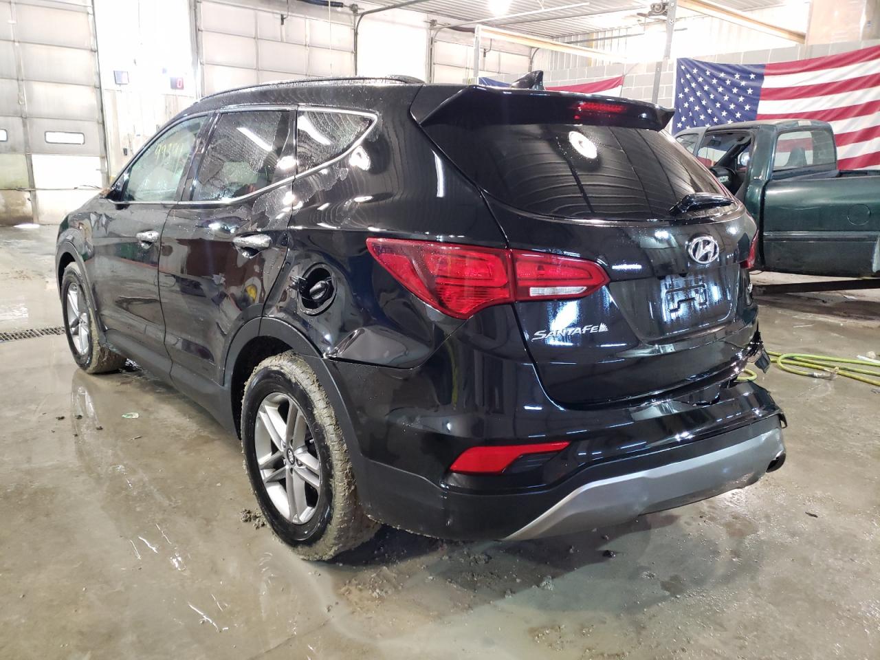 Photo 3 from auction – 2017 HYUNDAI SANTA FE S with VIN 5NMZU3LB4HH041382