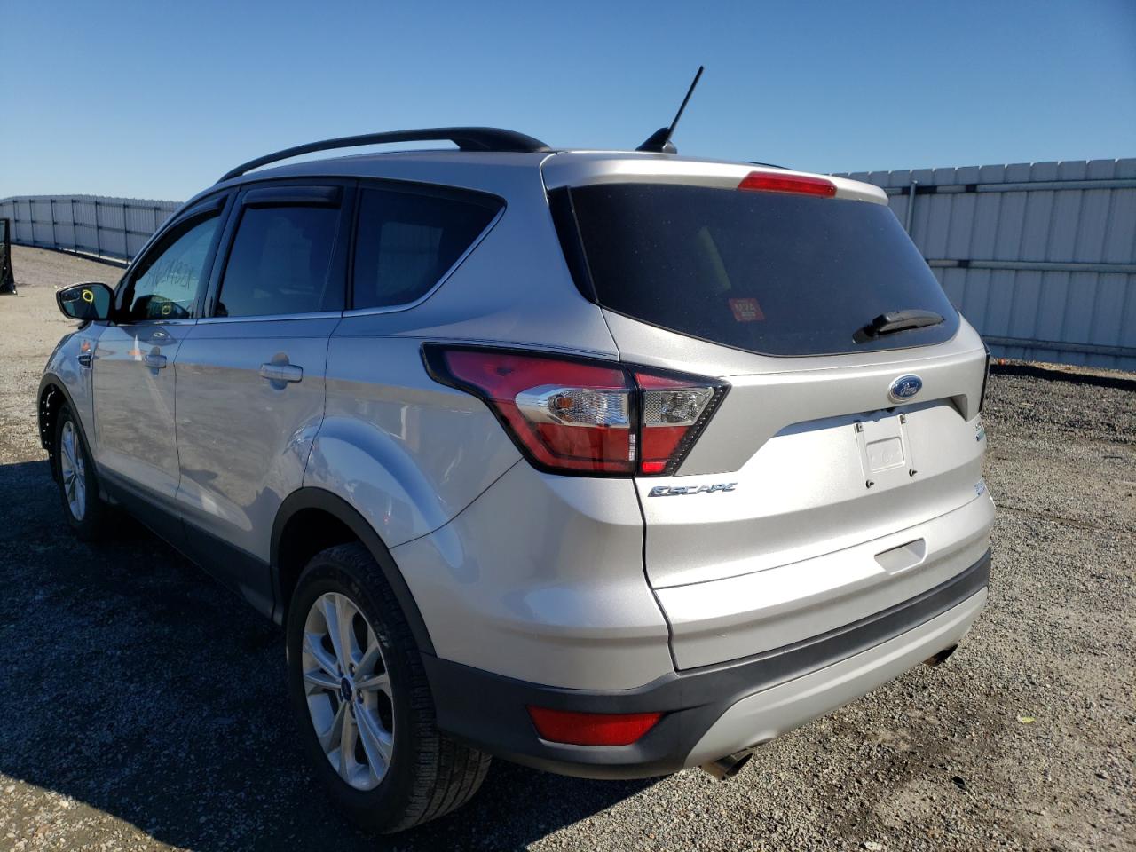 Photo 3 from auction – 2018 FORD ESCAPE SE with VIN 1FMCU0GD2JUA80076