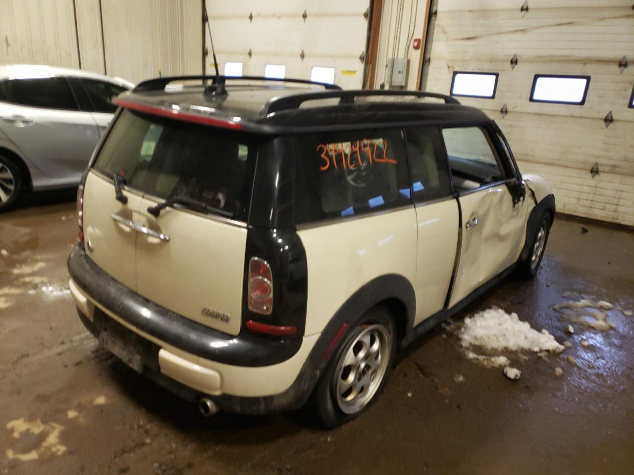 Photo 4 from auction – 2014 MINI COOPER CLU with VIN WMWZF3C58ET571625