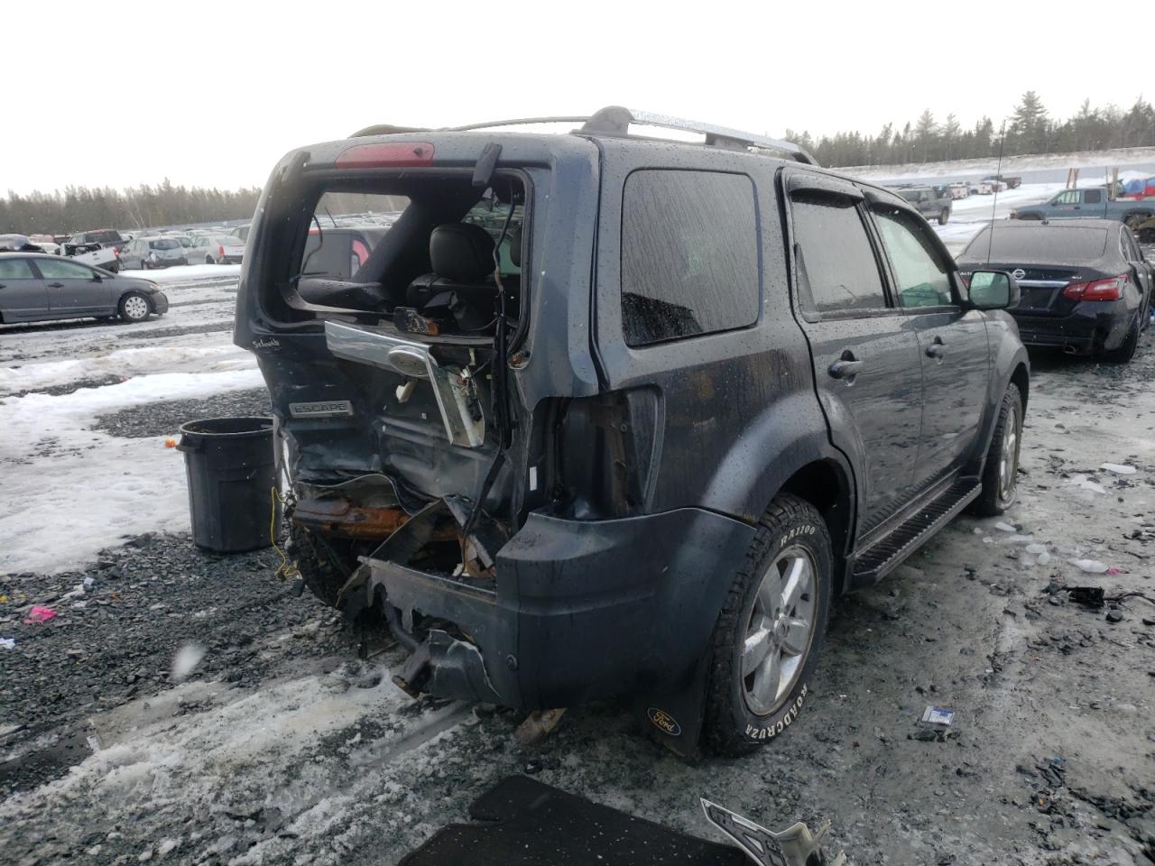 Photo 17 from auction – 2009 FORD ESCAPE LIM with VIN 1FMCU94G99KC95156