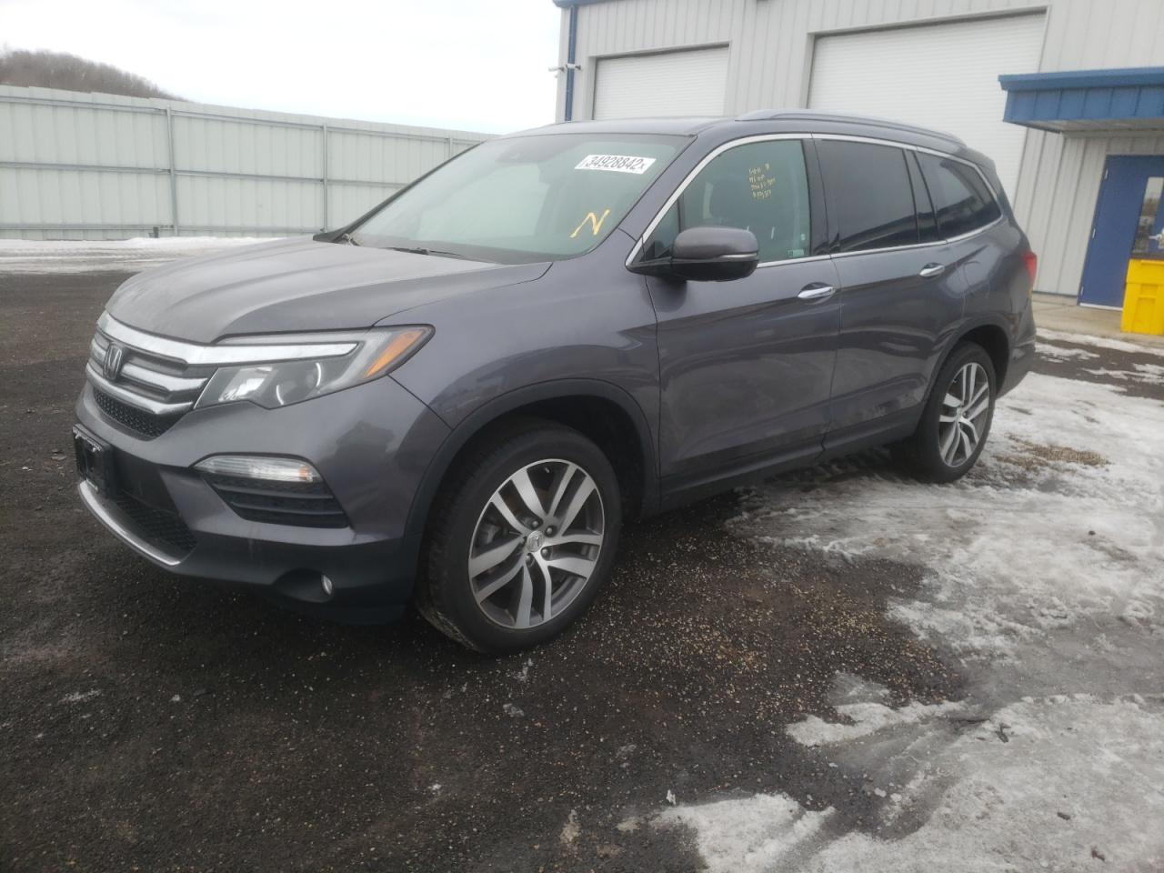 Photo 2 from auction – 2018 HONDA PILOT TOUR with VIN 5FNYF6H97JB009854