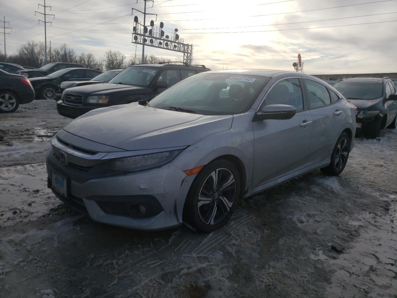 Photo 2 from auction – 2016 HONDA CIVIC TOUR with VIN 19XFC1F97GE024472