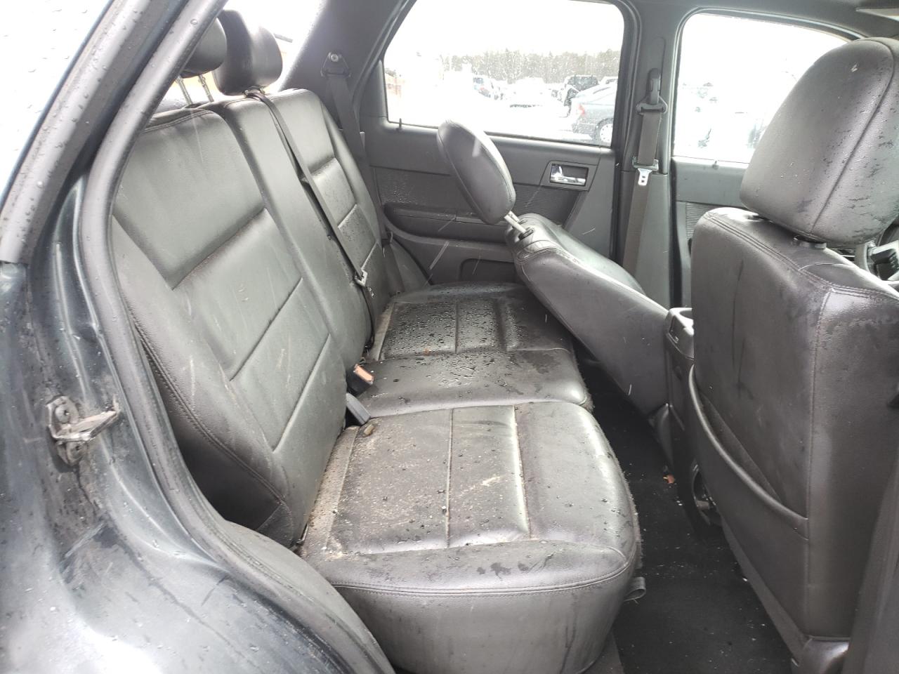 Photo 18 from auction – 2009 FORD ESCAPE LIM with VIN 1FMCU94G99KC95156