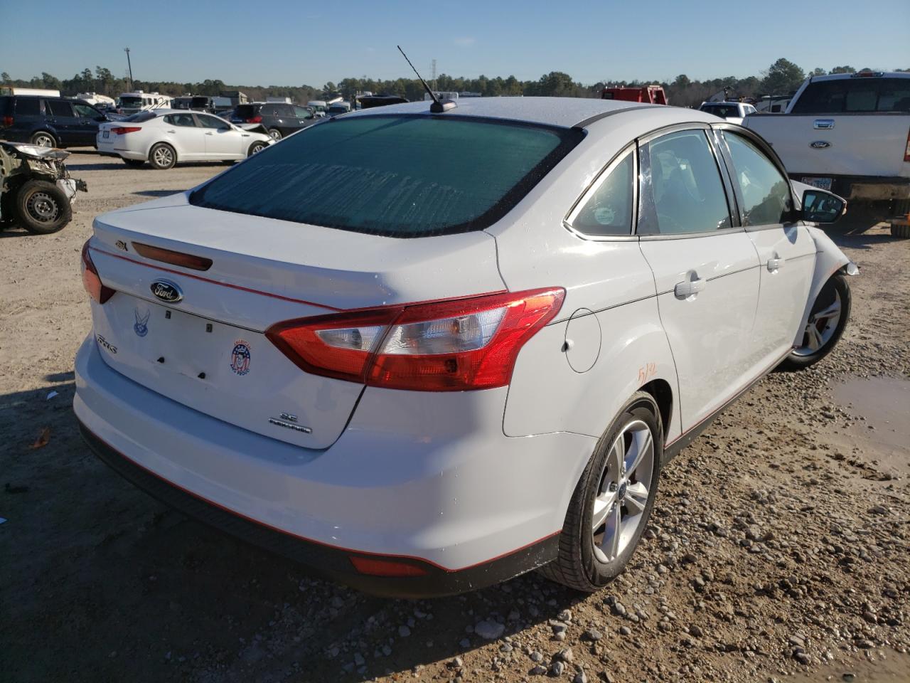 Photo 4 from auction – 2014 FORD FOCUS with VIN 1FADP3F27EL400835