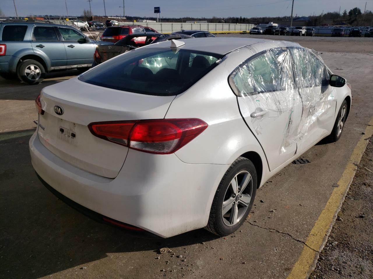 Photo 4 from auction – 2018 KIA FORTE LX with VIN 3KPFL4A79JE216927
