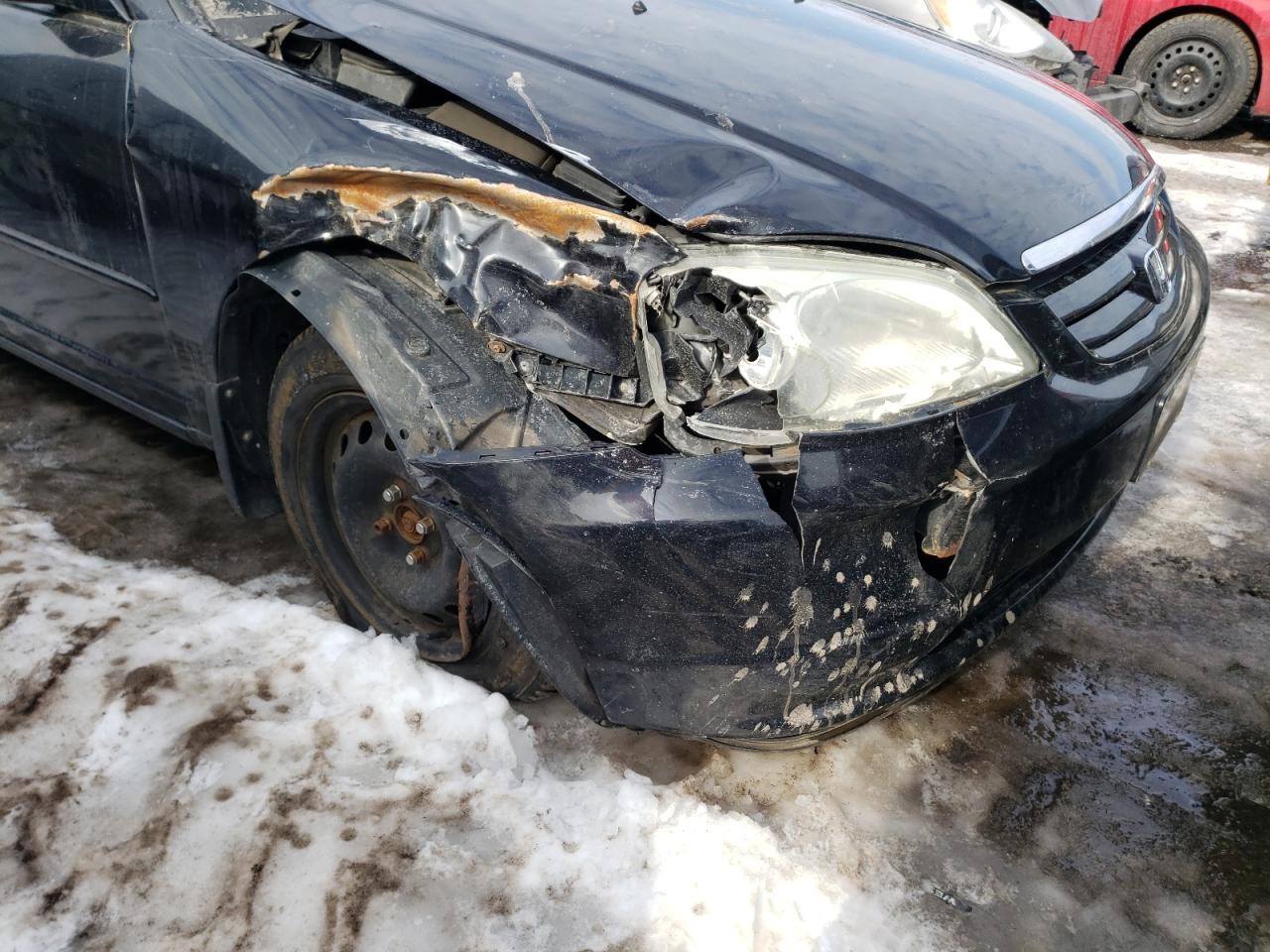 Photo 9 from auction – 2003 HONDA CIVIC LX with VIN 2HGES16893H908435