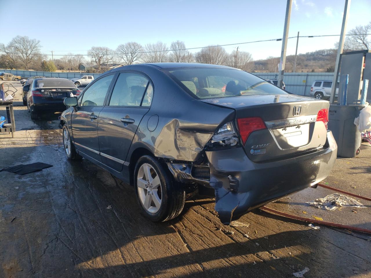 Photo 3 from auction – 2011 HONDA CIVIC LX with VIN 19XFA1F55BE021341