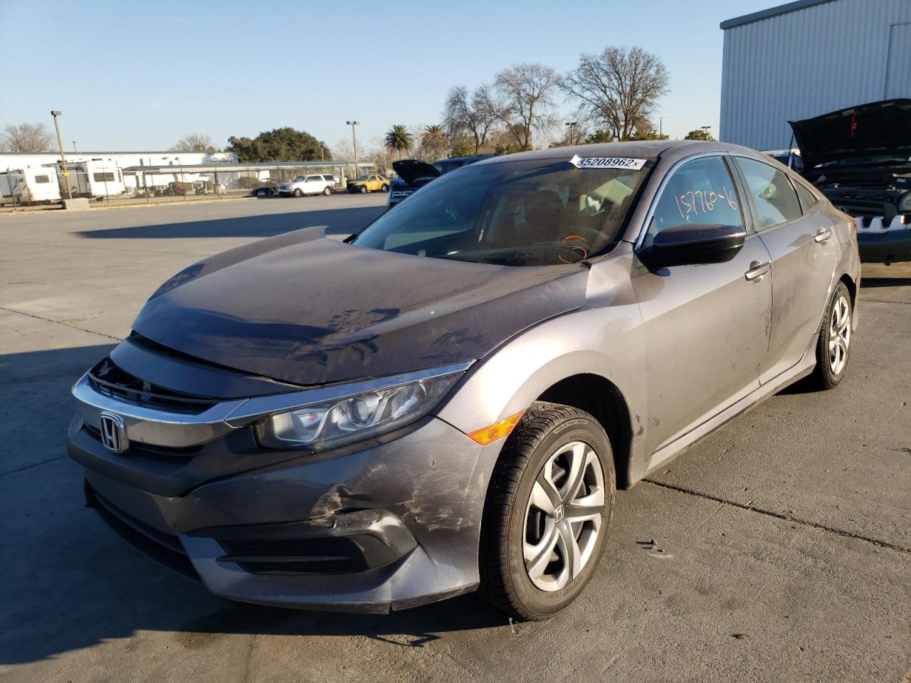 Photo 2 from auction – 2016 HONDA CIVIC LX with VIN 19XFC2F54GE211591
