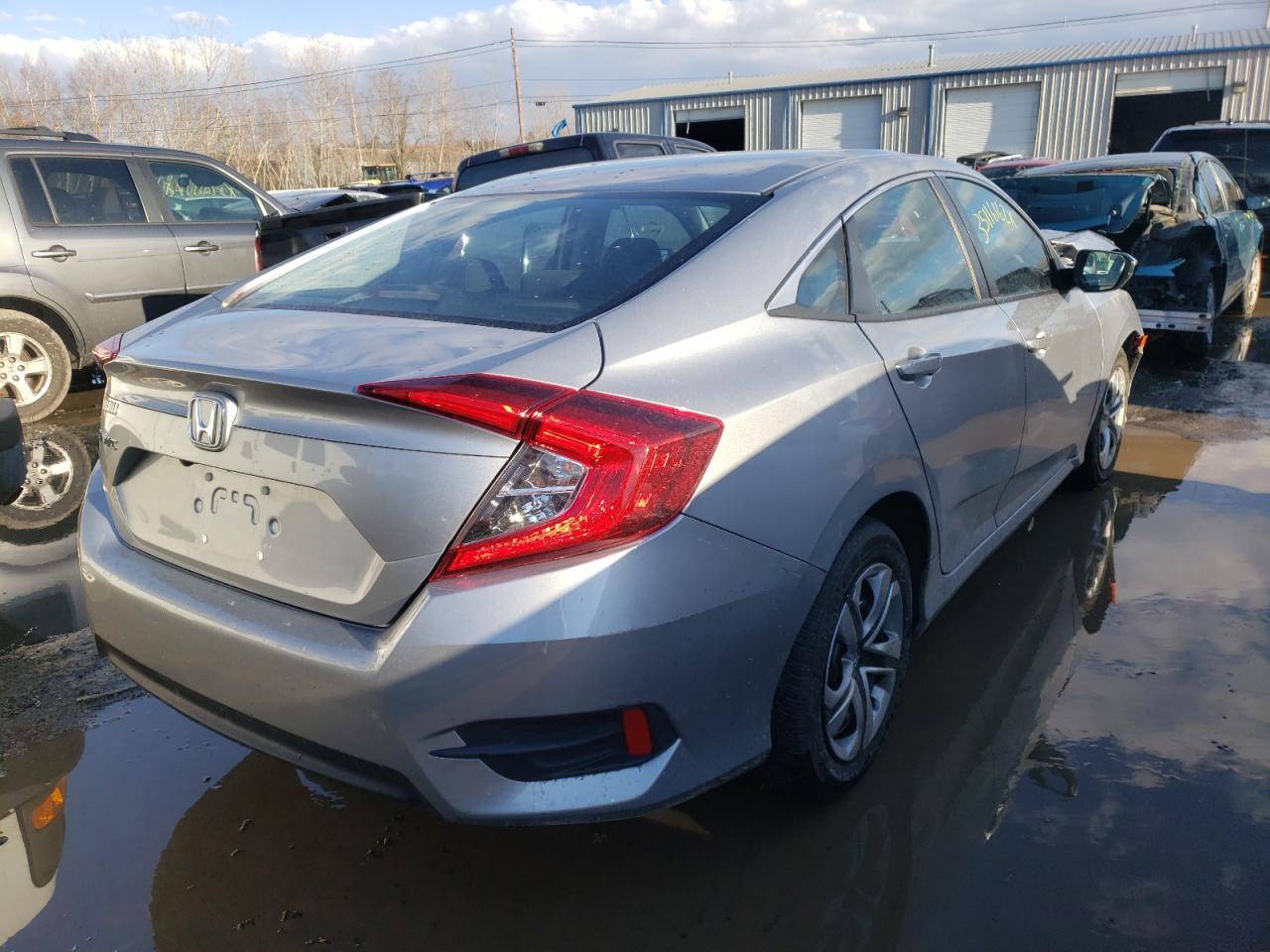 Photo 4 from auction – 2018 HONDA CIVIC LX with VIN 2HGFC2F59JH603334
