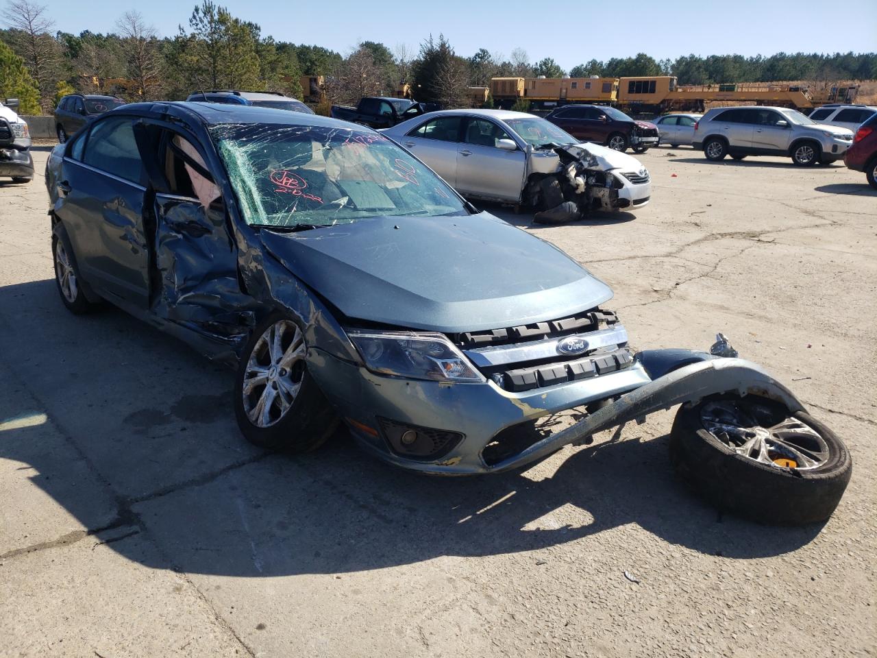 FORD FUSION SE 2012 with VIN 3FAHP0HA2CR370453 - Photo from auction