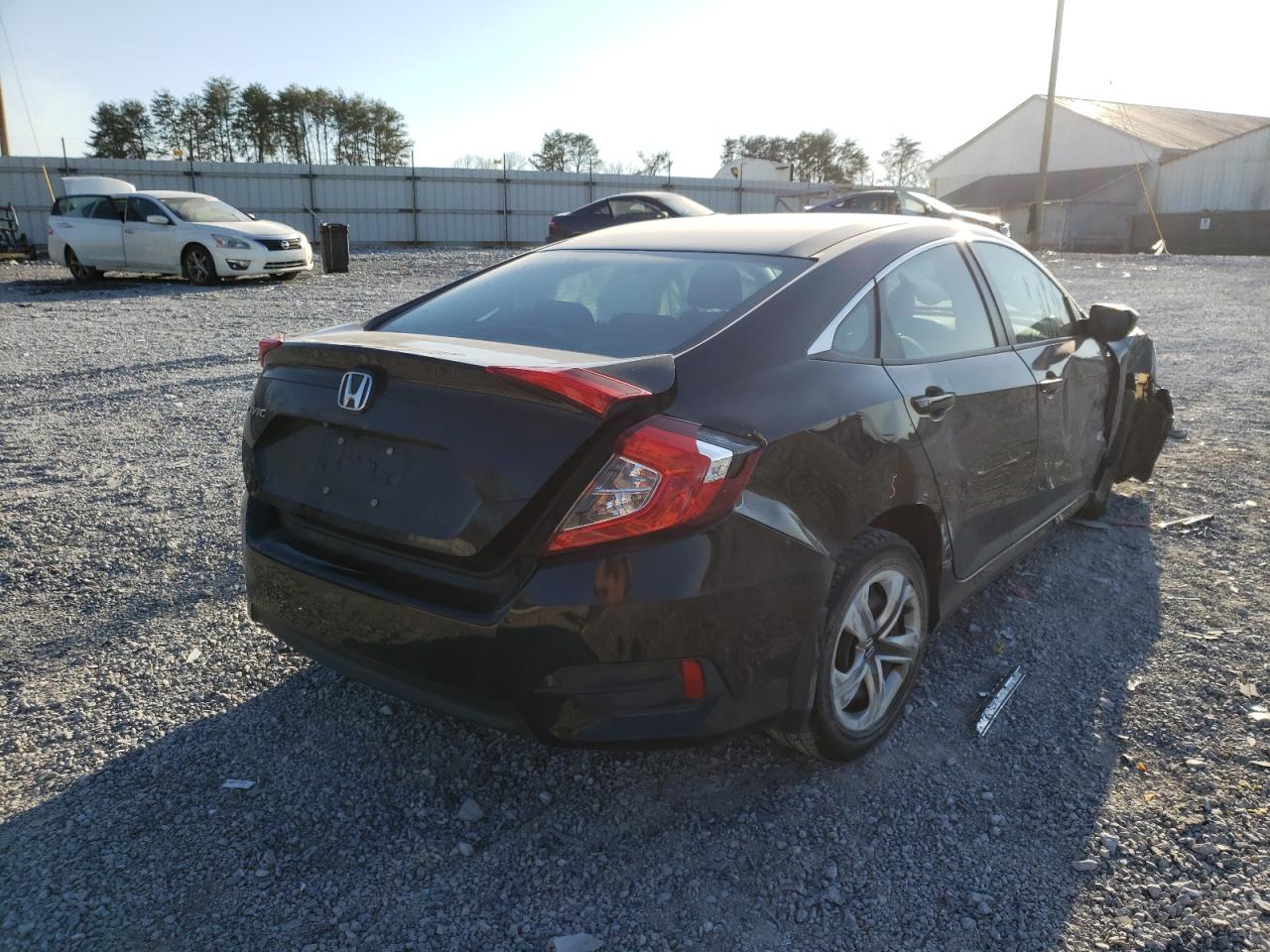 Photo 4 from auction – 2017 HONDA CIVIC LX with VIN 19XFC2F59HE028978